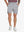 Front lower-body view of model wearing LIGHT GREY Water Resistant Versatile 8 Pockets Shorts.