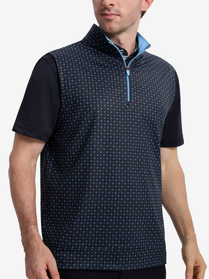 Front upper body shot of model wearing navy flower  full print quarter zip sleeveless vest pullover