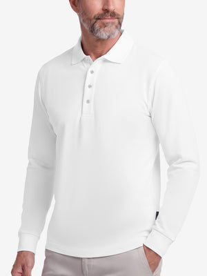 Front upper body shot of model wearing white solid stretch cotton pique long sleeve polo shirts