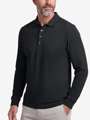 Front upper body shot of model wearing black solid stretch cotton pique long sleeve polo shirts
