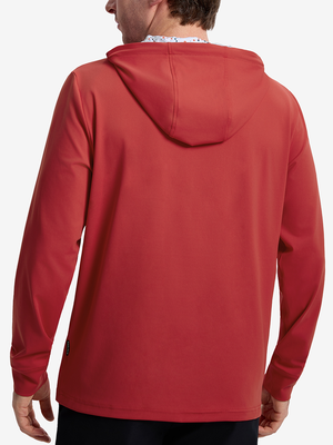 Back view of model showcasing red soft stretchy hoodie with inner print hood