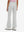 Back lower body shot of model wearing silver gray women's high waist stretch golf pants with pockets