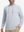 Front view of model showcasing misty blue soft stretchy hoodie with inner print hood