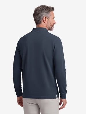Back upper body shot of model wearing navy solid stretch cotton pique long sleeve polo shirts