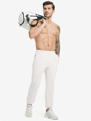 Full body front view of model wearing Water Resistant Comfy Fleece Golf Joggers in oyster grey