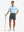 Full-body shot of model holding golf club, styled with Dark Grey Quick Dry Casual Shorts.