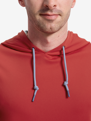 Close-up front view from nose to chest of model wearing red soft stretchy hoodie with inner print hood