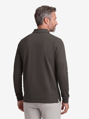 Back upper body shot of model wearing dark brown solid stretch cotton pique long sleeve polo shirts