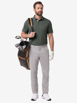 Front full body shot of model wearing grey ultra-comfort slim fit roma knit polo shirts with golf bag on back