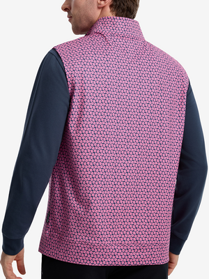 Back upper body shot of model wearing red navy flower full print quarter zip sleeveless vest pullover