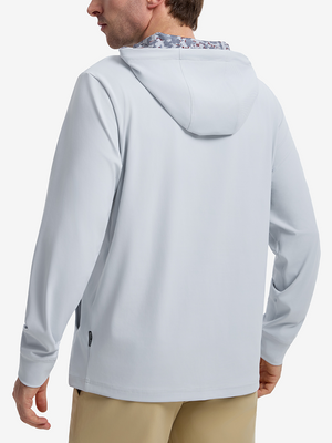 Back view of model showcasing misty blue soft stretchy hoodie with inner print hood