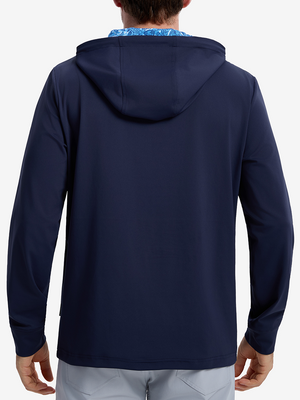 Back view of model showcasing navy soft stretchy hoodie with inner print hood