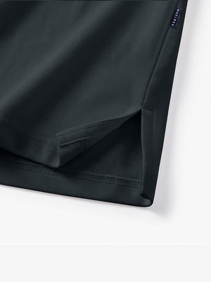 Detail view of hem on dark gray solid stretch cotton pique long sleeve polo shirts