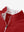 Collar zipper and inner neck pattern detail of the lightweight golf quarter zip pullover in red.