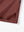 Detail view of hem on wine solid stretch cotton pique long sleeve polo shirts
