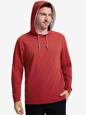 Front view of model showcasing red soft stretchy hoodie with inner print hood