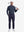 Front full body shot of model wearing navy warm brushed mock neck golf t shirt with golf club resting on shoulder