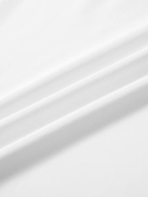 Close-up texture of  white solid stretch cotton pique long sleeve polo shirts fabric showing detailed premium material and weave.