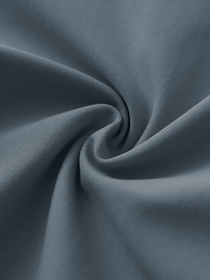 Texture close-up of Stretch plain everyday pants showing flexible fabric in dark grey