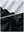 Close-up view of black grey leaf2  full print quarter zip sleeveless vest pullover showing inner lining and outer fabric  details