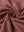 Close-up of brick melange pinstripe quarter zip pullover fabric showing fine lines and soft knit texture.