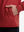 Close-up view of red soft stretchy hoodie with inner print hood outer pocket detail