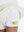 Detail view of side inner pocket on white women's gym golf shorts with liner pocket