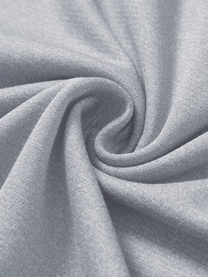 Close-up texture of  lunar rock melange lightweight sleeveless quarter zip golf vest fabric showing detailed premium material and weave