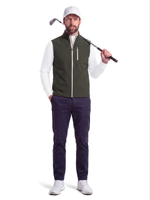 Front full body shot of model wearing white warm brushed mock neck golf t shirt with golf club resting on shoulder