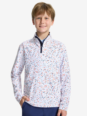 Front upper body shot of model wearing white polka dots youth print midlayer Q-zip pullover sweatshirt